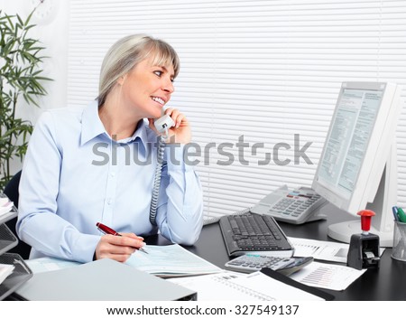 Business woman working in the office. Accounting and finance.