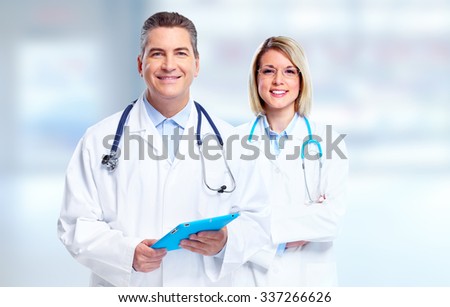 Group of medical doctors with tablet computer. Health care.