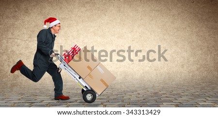 Delivery man with boxes. Express Christmas shipping.