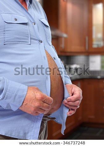 Senior man with big fat stomach. Obesity concept.