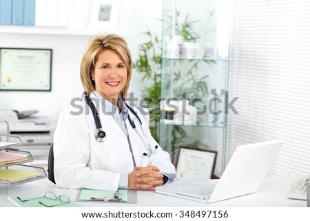 Mature doctor woman in a clinical office. Health care concept.