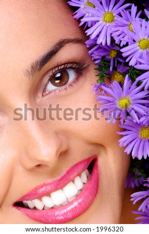 beautiful woman face and blue flowers
