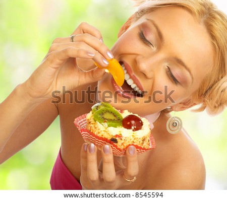 stock-photo-pretty-woman-eating-the-cake