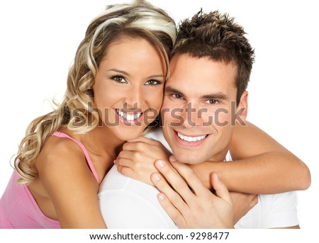 stock photo : Young love couple smiling. Over white background