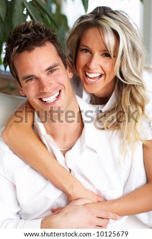 stock photo : Young love couple smiling in the comfortable apartment