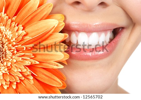 Beautiful young woman smile and teeth.  Close up