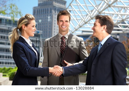Business  meeting in the downtown. Businessmen and business woman