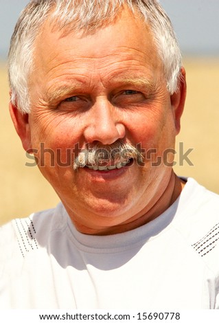 Smiling happy elderly man  outdoor