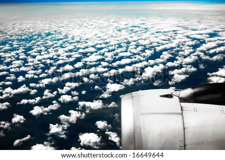 White clouds. View from the window of the plane