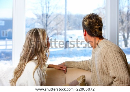 Young  couple in love looking in the window