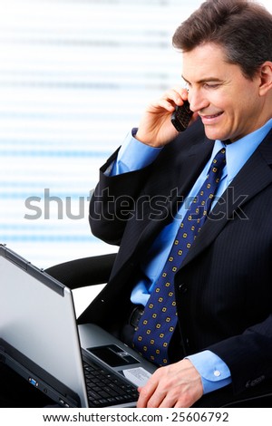 businessman  working with laptop and calling by cellular