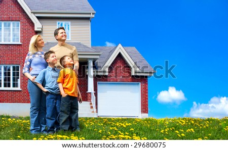 Young family dreaming about a new home.  Real estate concept