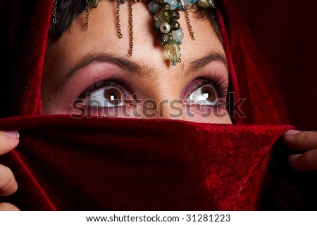 Mysterious eastern woman with beautiful eyes.