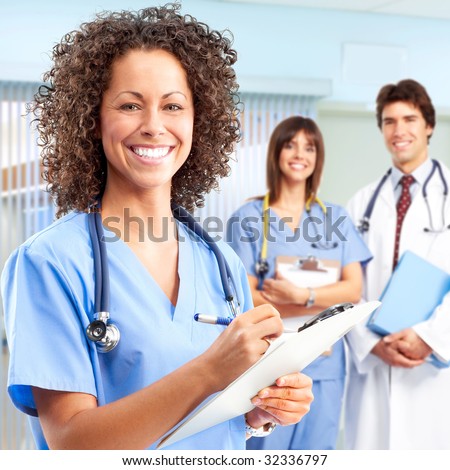 Smiling medical people with stethoscopes. Doctors and nurses
