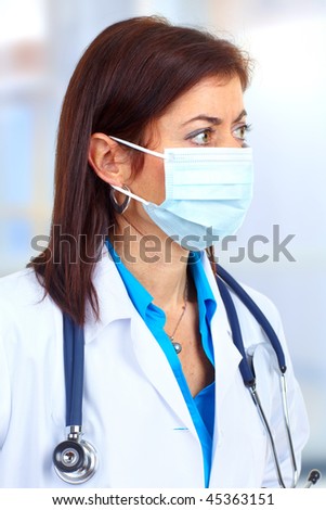 Medical doctor with mask and stethoscope.