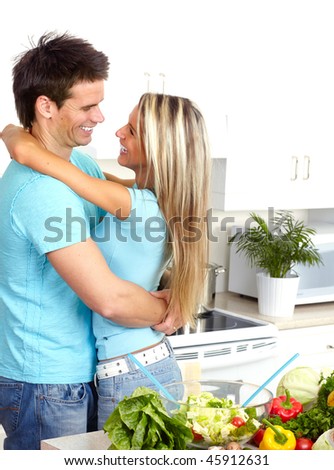 Young love couple at white kitchen