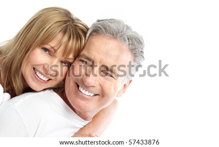 Happy senior couple in love. Healthy teeth. Isolated over white background