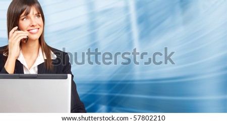 Young smiling  business woman with laptop and cellular