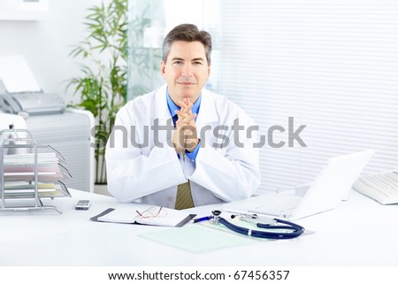 Medical doctor working with laptop in the office