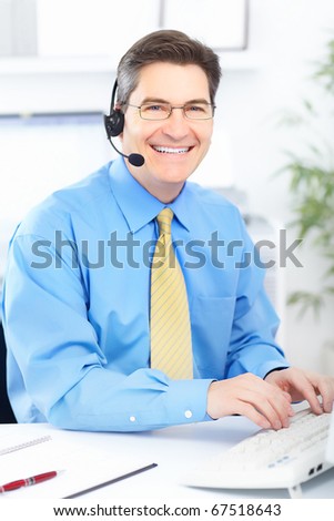 Smiling customer service operator in the office
