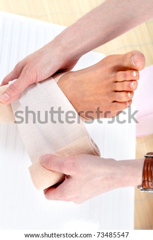 Foot joint pain. Medical bandage. Health care