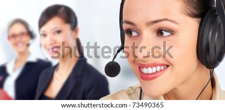 Beautiful  call center operator with headset. Over blue background .