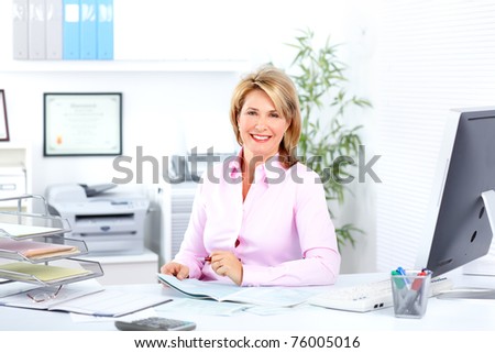 Smiling business woman  working at modern office