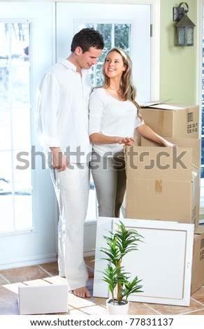 Young happy couple  moving into their new home