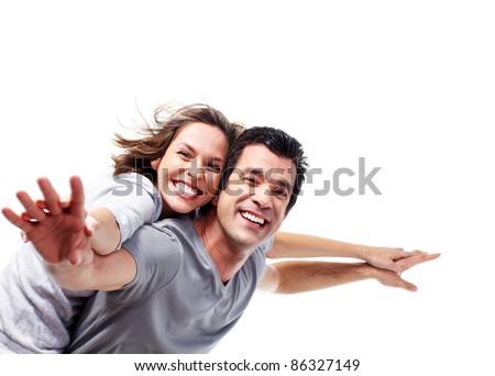 Happy smiling couple in love. Isolated over white background.