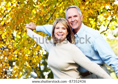 Happy senior couple in love at the park.