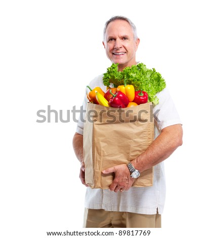 Senior man with a grocery shopping bag. Isolated on white background.