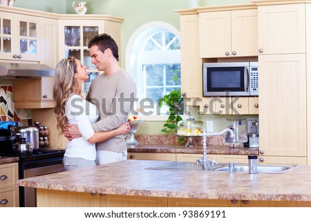 Happy young couple in love at new home.