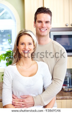 Happy young couple in love at new home.