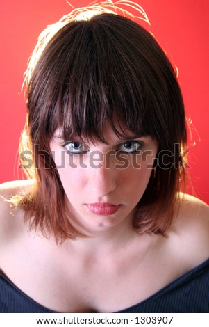 Devil-woman on red background