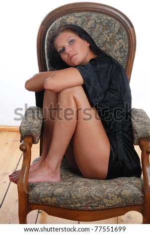 young woman sitting on the chair