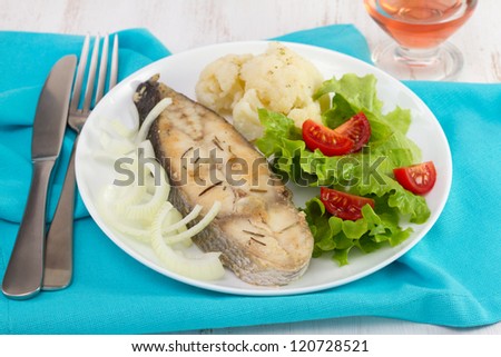 fried fish with onion, boiled cauliflower and salad