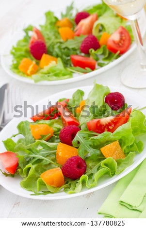 fresh salad with raspberries
