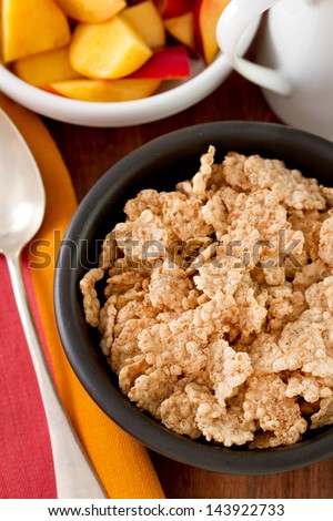 cereals in bowl and nectarine