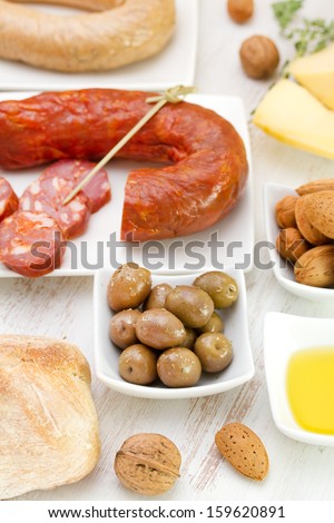 olives with chourico, bread and oil