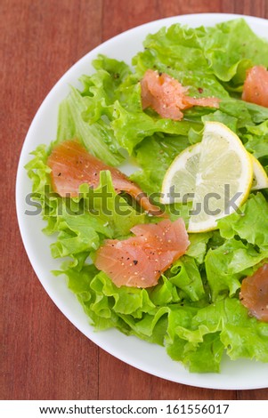 salad with salted fish and lemon