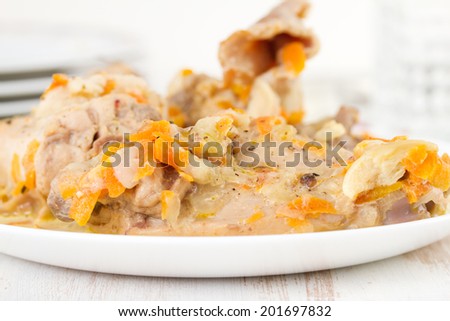 rabbit with carrot on plate