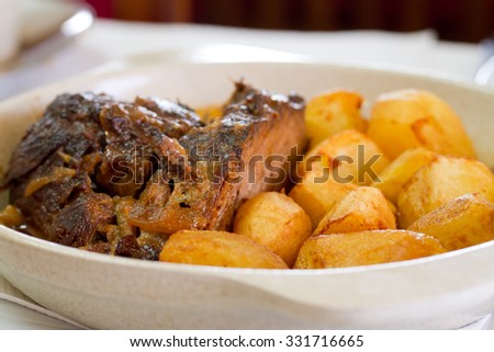 baked meat with potato in dish