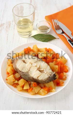boiled fish and vegetables with glass of wine