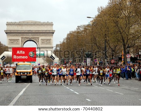 PARIS, FRANCE - APRIL 6: Group of runners start on Champs Elysees  the Paris Marathon, April 6, 2008 in Paris, France