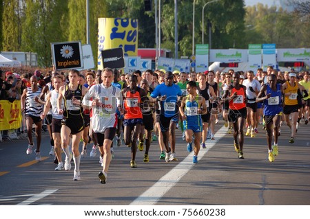 ZURICH, SWITZERLAND - APRIL 17: Group of runners starts the Zurich Marathon, April 17, 2011 in Zurich, Switzerland.