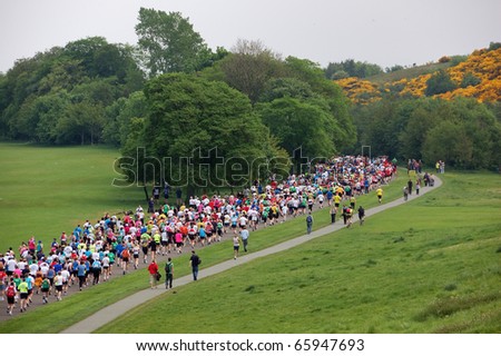 stock photo   edinburgh  scotland  uk   may 23  runners run the edinburgh