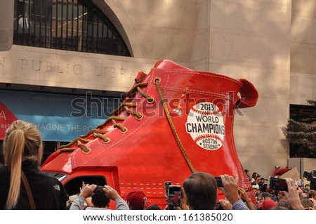 BOSTON, MASS.- 2 Nov: A truck-mounted World Series Champions shoe in the Boston Red Sox Rolling Rally held in Boston on 2 November 2013.