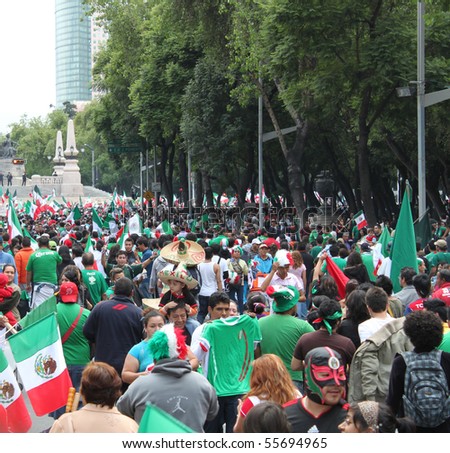 MEXICO CITY - JUNE 17 : Celebration of triumph of Mexican national football team against France at Reforma Avenue on June 17, 2010 in Mexico City.