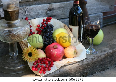 Harvest Basket filled with Fruit, Wine Bottle and Glass