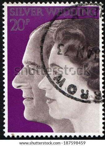 USA, circa 1974: Queen Elizabeth II and and Prince Philip on vintage postage stamp, circa 1974